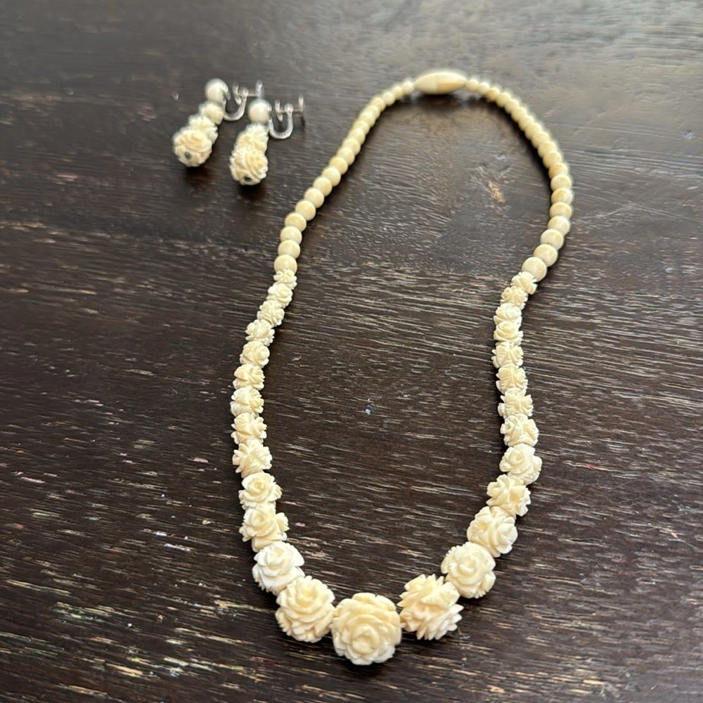 Vintage plastic carved cascading floral design with matching drop earrings!